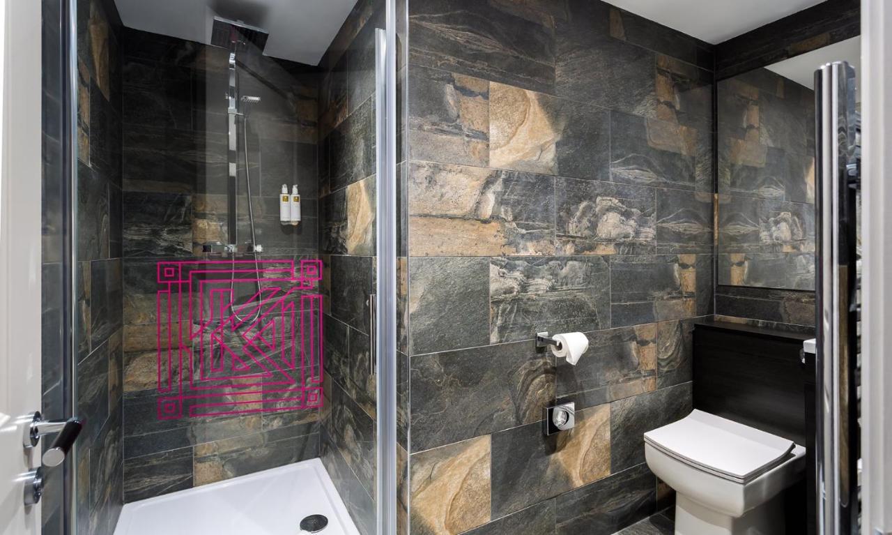 Kotel Windermere Exterior foto A shower enclosure